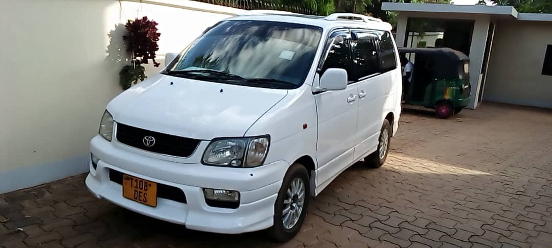 Moshi to Materuni waterfalls and coffee tour taxi Services
